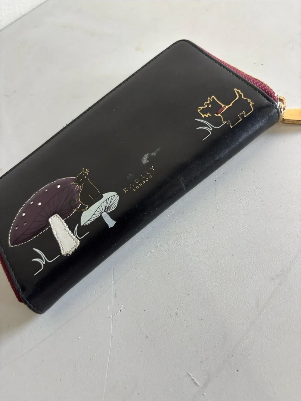 RADLEY LONDON Black & Burgundy Zip-Around Wallet with Mushroom and Dog Motif
